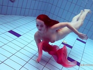 Redhead in a difficulty pool
